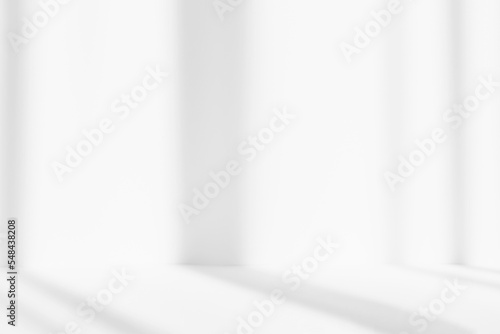 Abstract white studio background for product presentation. Empty room with shadows of window. Display product with blurred backdrop.