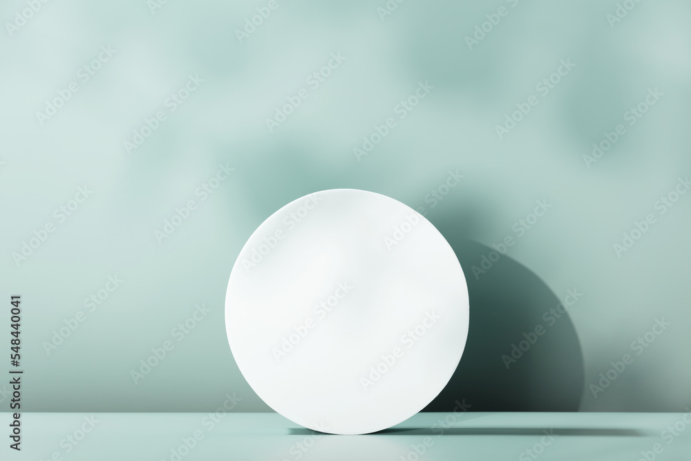 White Cylinder podium with leaves shadows. Scene to show products. Showcase, display case. White Cylinder podium with leaves shadows. Scene to show products. Showcase, display case.