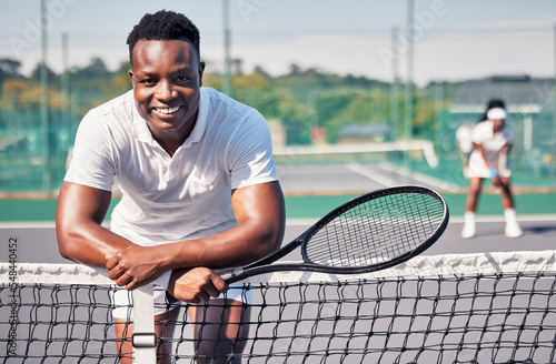 Tennis, fitness portrait or black man with smile for training, motivation or sport workout in tennis court. Athlete, happy or tennis player for wellness, exercise or health outdoors leaning on net