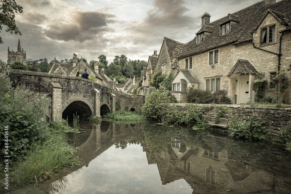 Beautiful British traditional village Castle Combe captured in a summer day in England, UK