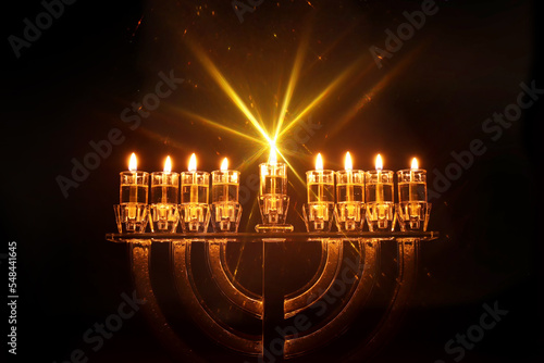 Photography Image of jewish holiday Hanukkah with menorah (traditional candelabra) and candl