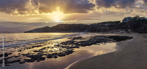 panoramic view of sunrise at Marikes beach at autumn, Greece