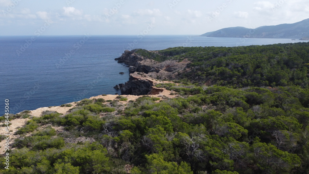 Drone shot of the cliffs in Portinax, Ibiza