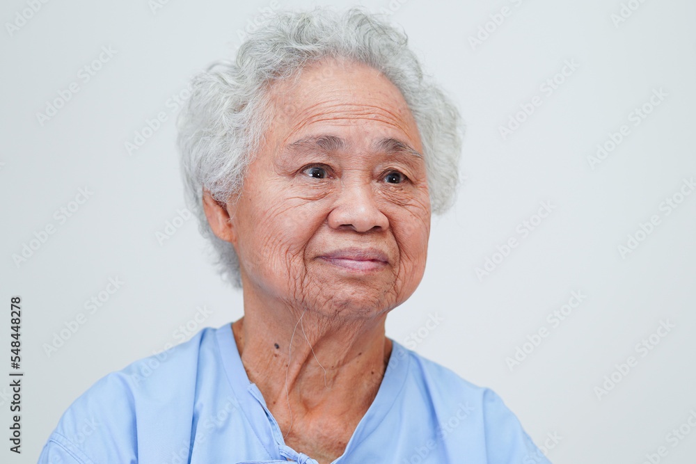 Asian elder senior woman patient sitting and smile face with happy on bed in hospital. Asian elder senior woman patient sitting and smile face with happy on bed in hospital.