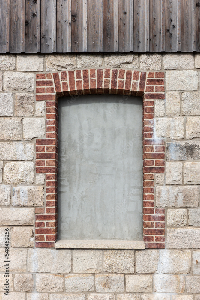 Bricked up window of an old building wall Bricked up window of an old building wall