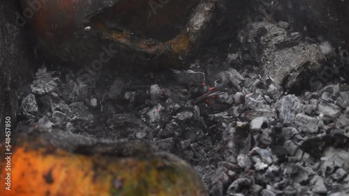 Wallpaper Mural orange halloween pumpkin in ashes from the fire in the yard Torontodigital.ca
