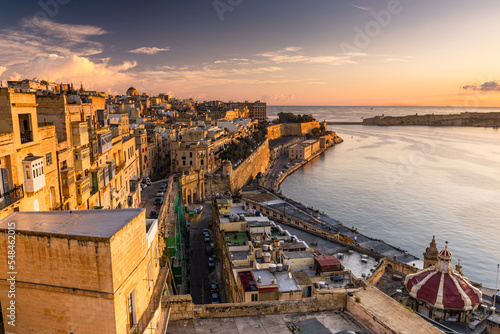 Sunrise at the Grand Harbour of Malta with the ancient walls of Valletta © marcin jucha