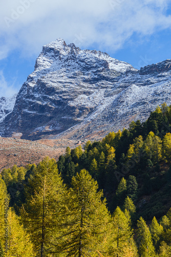 The mountains of the Val di Camp, a small valley near the village of Poschiavo, during an autumn day, Canton of Grisons, Switzerland - October 2022.