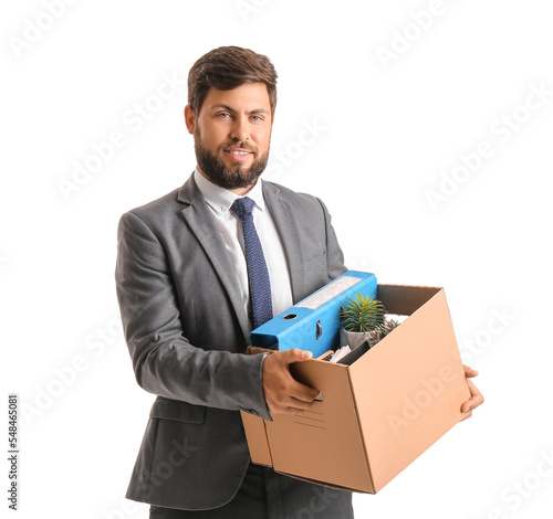 Fired young man holding box...