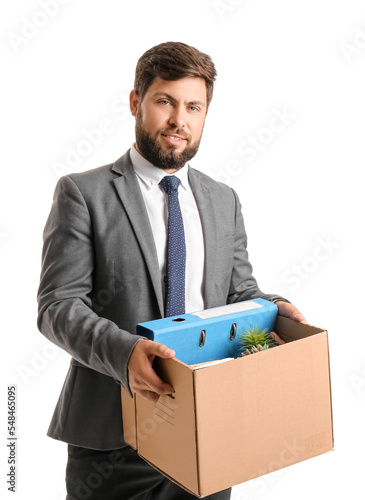 Fired young man holding box...