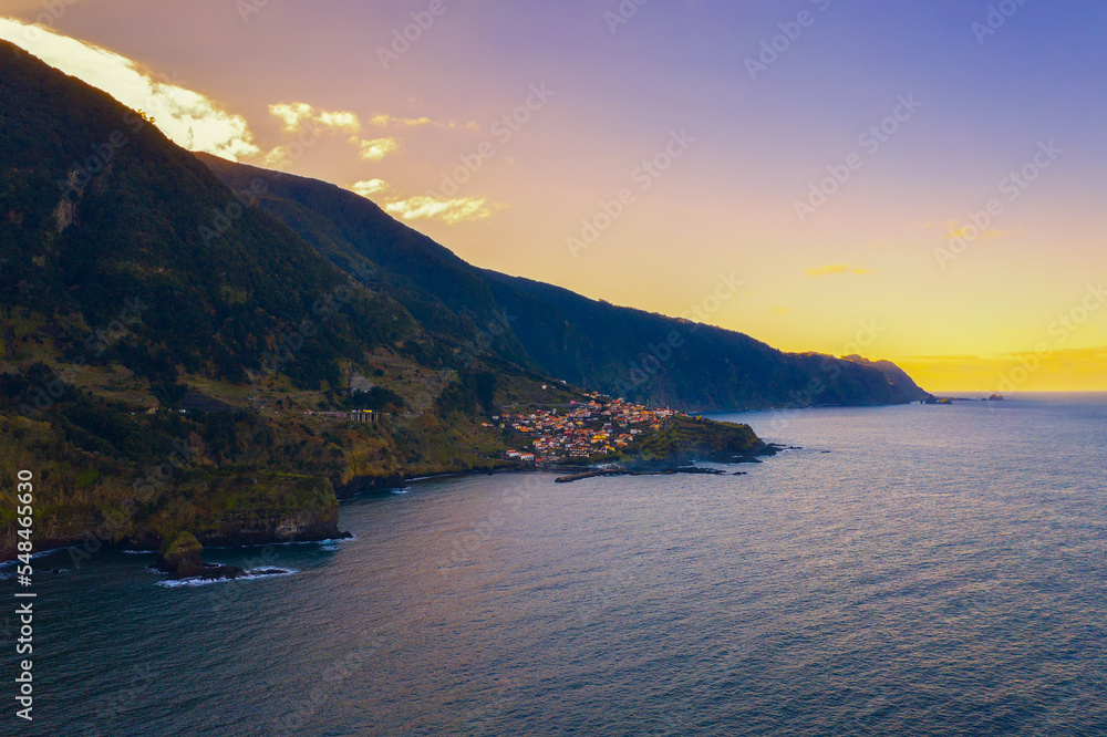 Aerial view of Seixal beach village on Madeira, Portugal at sunset
