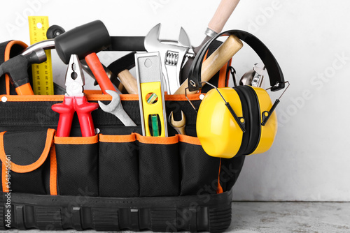Bag with builder's tools an...