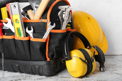 Bag with builder's tools an...