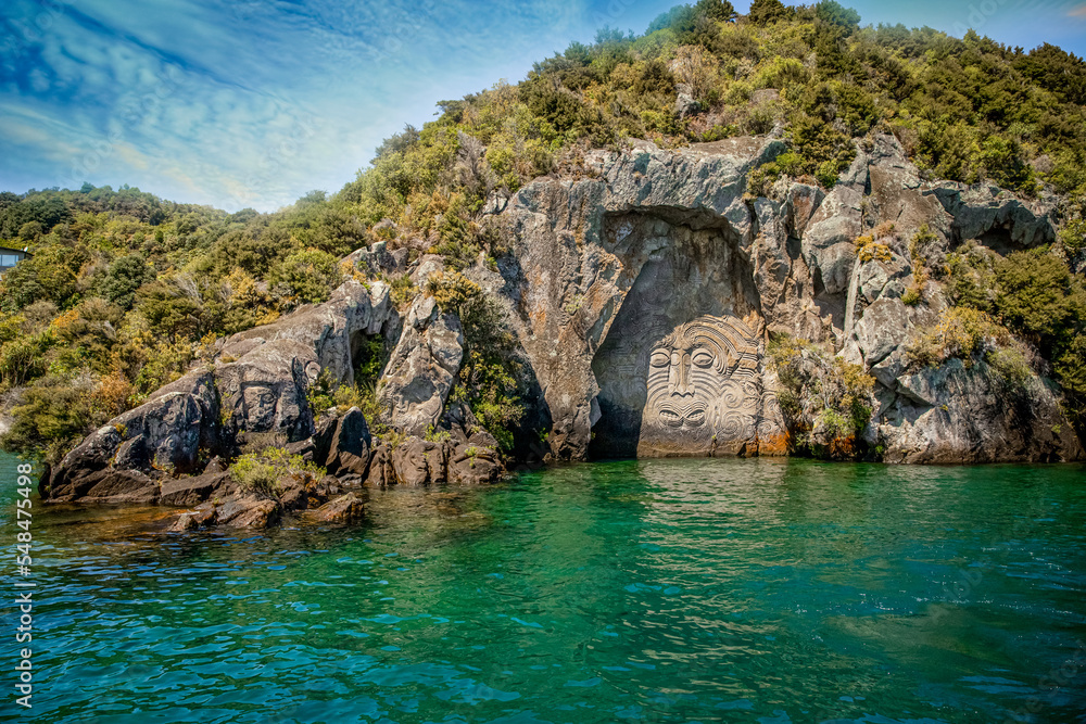 traditional rock carving lake taupo north island new zealand. High quality photo