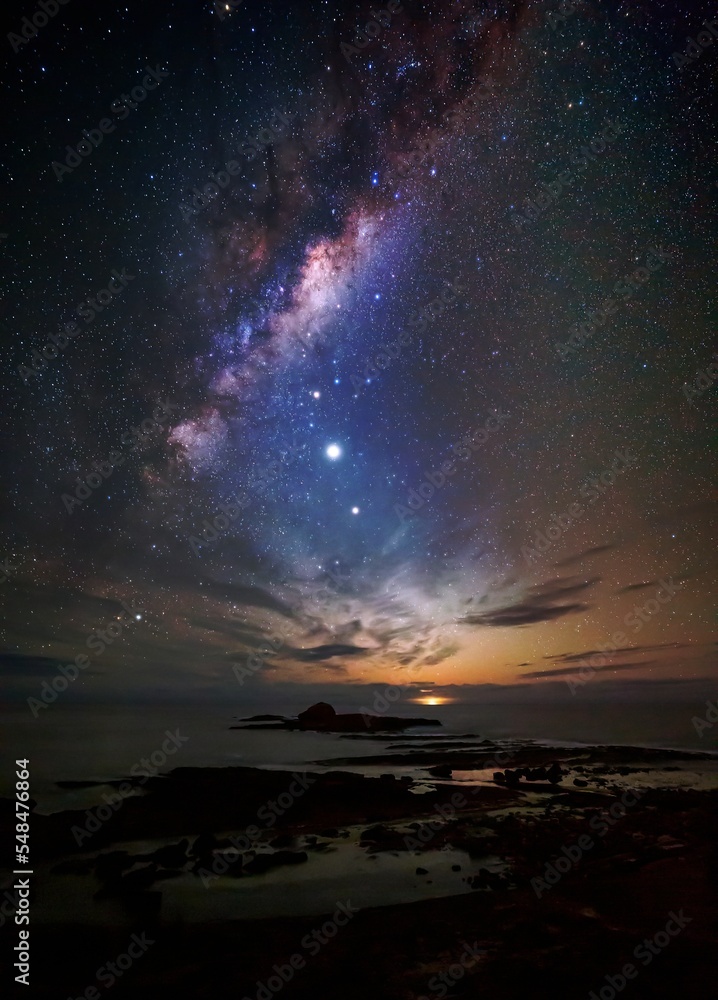 Milky way over the coast as dawn approaches