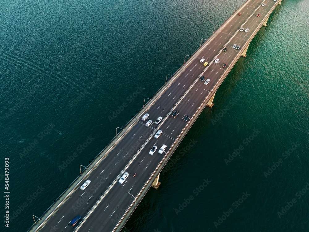 Vehicles on bridge over water