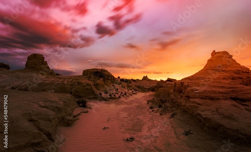 Sunset in sandy desert photo