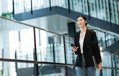 Portrait of a beautiful young Asian businesswoman at the company