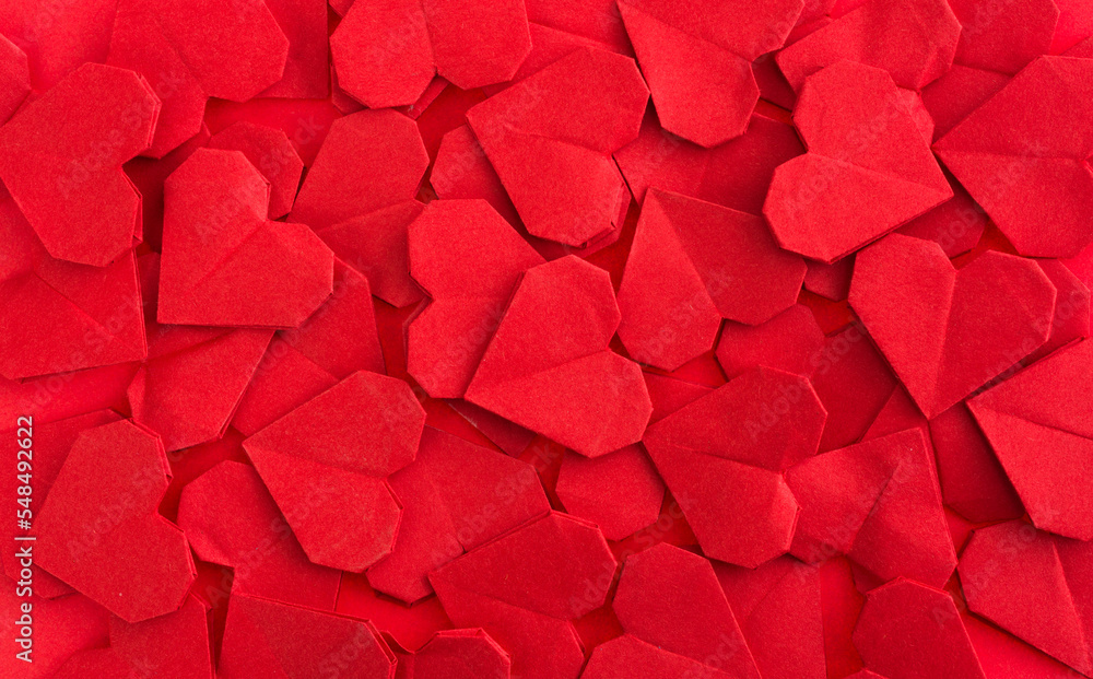 A group of red origami hearts background A group of red origami hearts background