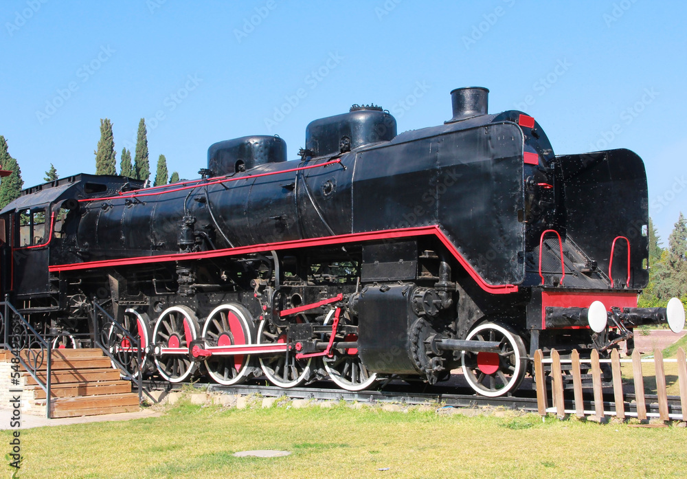 Vintage rare black steam locomotive with red decorative trim