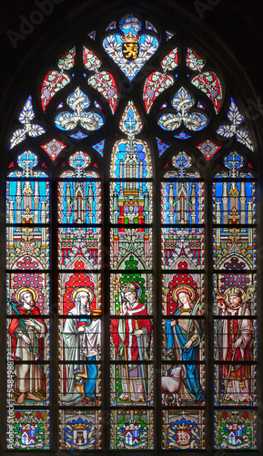 BRUSSELS - JUNE 22  Saints from windowpane in gothic church Notre Dame du Sablon on June 22  2012 in Brussels.