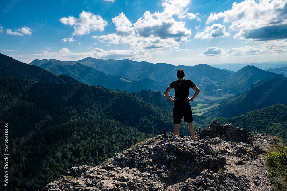 Fototapeta premium Man on the hill in Small Fatra mountains in Slovakia, Europe