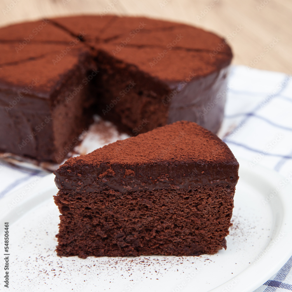 A slice of classic soft and rich chocolate cake A slice of classic soft and rich chocolate cake