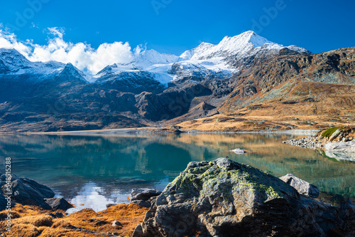 Scenic view of turquoise colored Lake "Lago Bianco" near Bernina Pass in the Swiss Alps