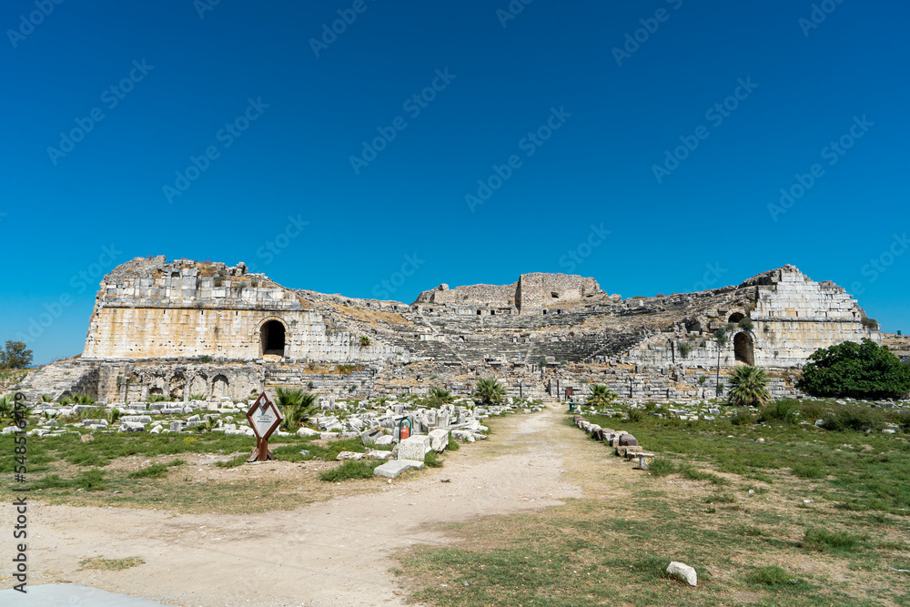 The scenic view of the ancient great greek theatre in Miletus, Turkey. Ruins of the ancient Caria. Copy space for text. 