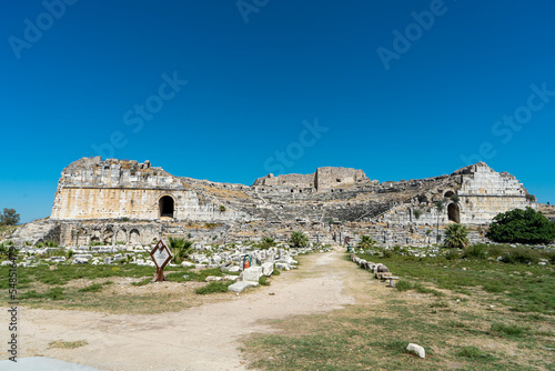 The scenic view of the ancient great greek theatre in Miletus, Turkey. Ruins of the ancient Caria. Copy space for text.  photo