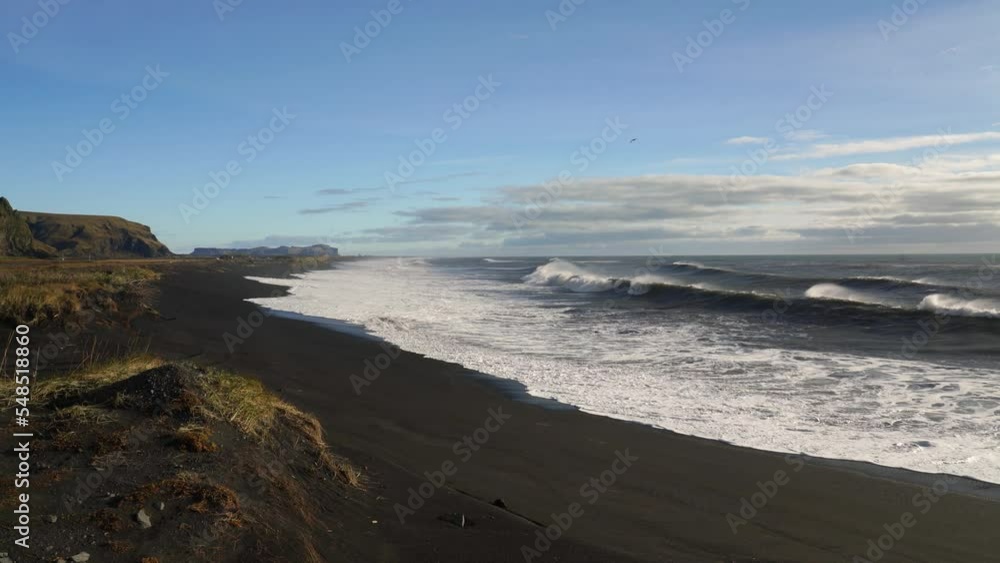 Panorama Of Black-sand Beach With Crashing Waves In Summer. - wide static Panorama Of Black-sand Beach With Crashing Waves In Summer. - wide static