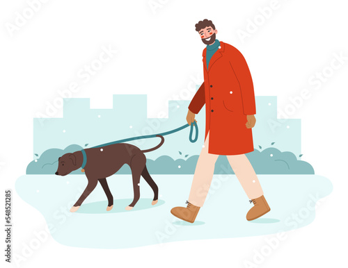 Young man walking with dog. Pet owner strolling with his dog on leash. Walk Your Dog Month concept. 