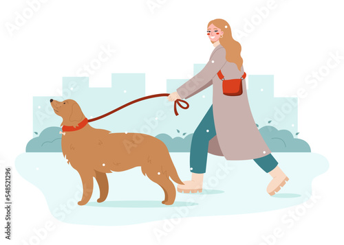 Young woman walking with dog. Pet owner strolling with his dog on leash. Walk Your Dog Month concept. 