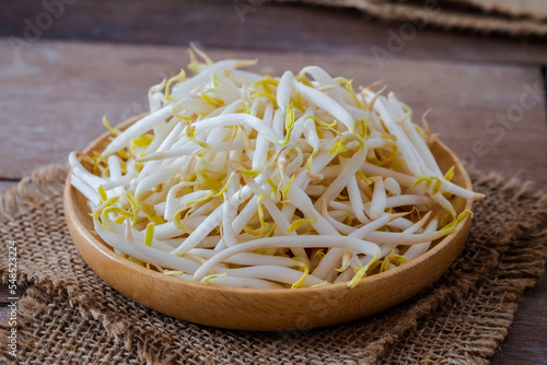 Bean sprouts on wooden plate