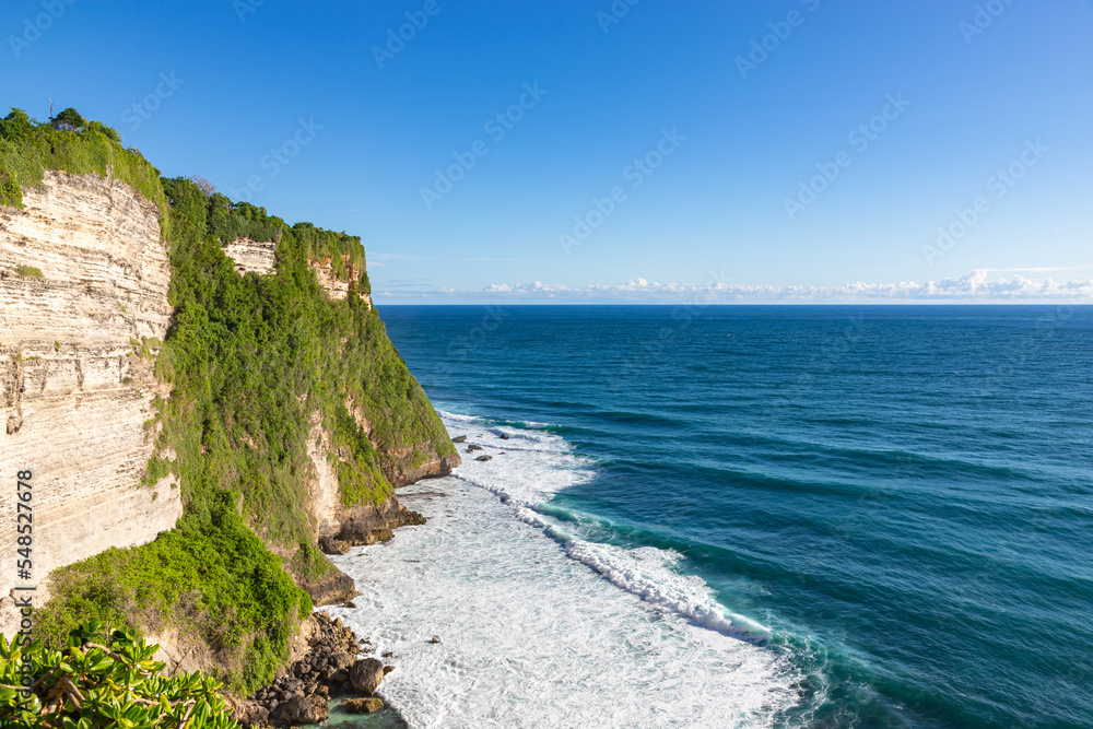 View of Uluwatu cliff and blue sea in Bali, Indonesia