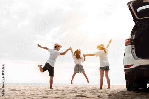 Family travel car road trip concept. summer vacation in car in the sunset, Dad, mom and daughter happy traveling enjoy and relaxation together driving in holidays, people,lifestyle with transportation