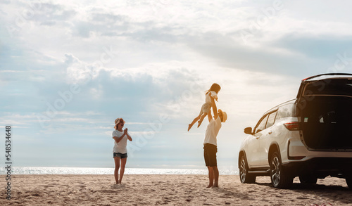 Happy Family with car travel road trip. summer vacation in car in the sunset, Dad, mom and daughter happy traveling enjoy together driving in holidays, people lifestyle ride by automobile.