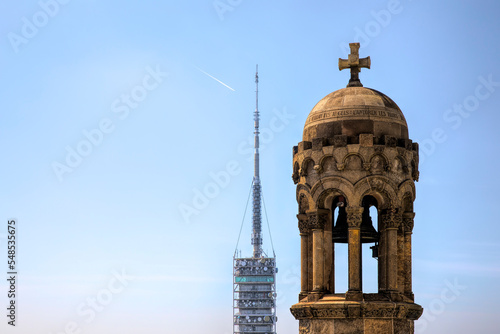 Old and New Communication – The Collserola Tower (Torre de Collserola) and One of the Bell Towers of the Holy Hearts Church (Sagrat Cor), Barcelona, Spain