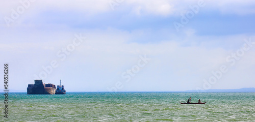 Traditional and Modern Elements Off the Coast of The Philippines, near Puerto Galera on Mindoro photo