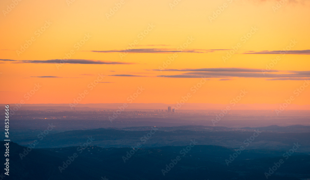 Highland misty valley under sunset sky Highland misty valley under sunset sky