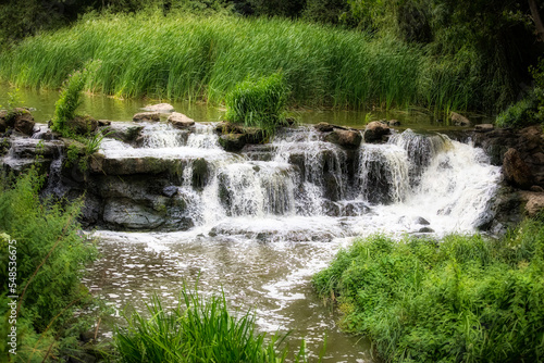 Fototapeta Naklejka Na Ścianę i Meble -  Waterfall in the Park Surrounding Hever Castle, Kent, England