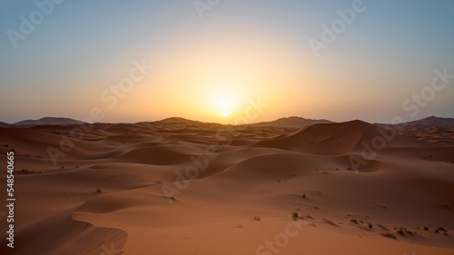 Beautiful sand dunes in the Sahara desert with amazing sunset sky - Sahara  Morocco