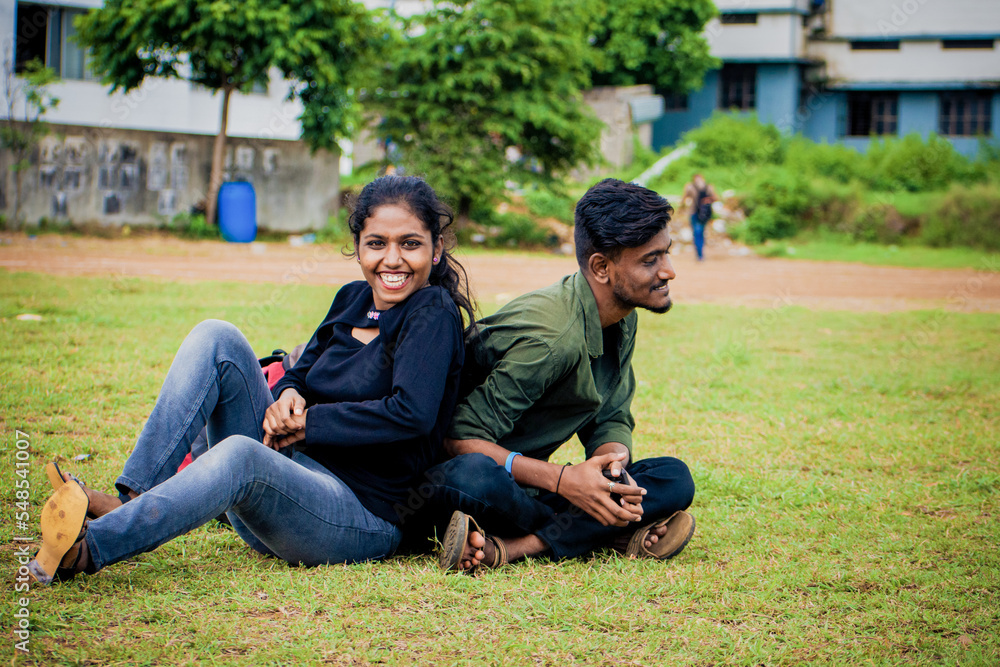 Two young friends having fun in college campus. Two young friends having fun in college campus.