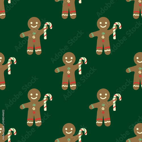 Cute gingerbread men, candy canes vector pattern background. Traditional Christmas smiling laughing cookie character motifs on dark green backdrop. Fun festive hand drawn naive style for Holidays.
