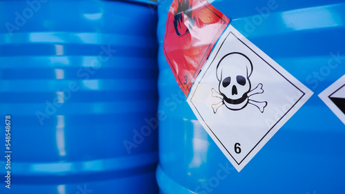Canvastavla Flammable, acid, volatile, warning labels, mounted on hazardous chemical storage tanks in the warehouse of a chemical industrial factory plant