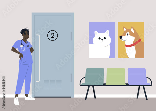 A young male African veterinary doctor waiting for visitors in the lobby, domestic animals health care