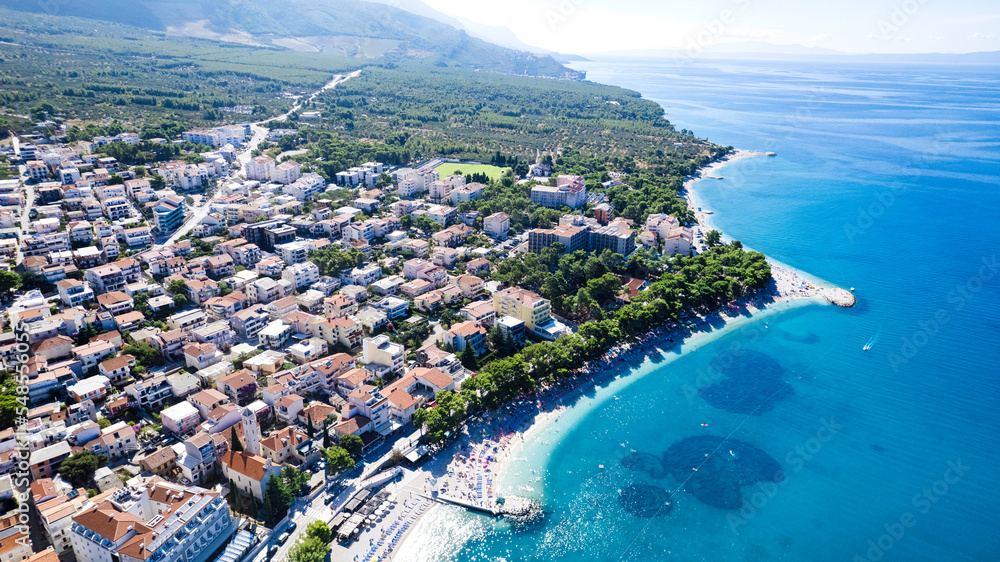 Amazing beach with cristalic clean sea water with pines in Croatia