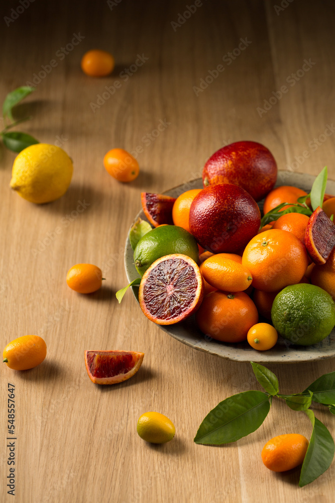A variety of fruits on a ceramic plate A variety of fruits on a ceramic plate
