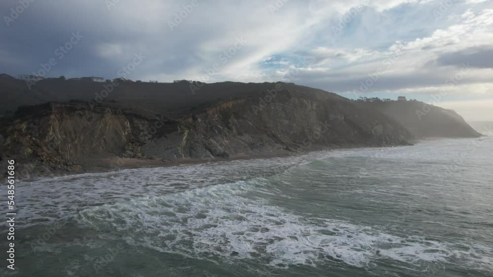 drone in France with plenty of houses, many basque one, much of homes, in a foam grey light ambiance, an amazing aerial view with clouds and ocean in Bidart drone in France with plenty of houses, many basque one, much of homes, in a foam grey light ambiance, an amazing aerial view with clouds and ocean in Bidart