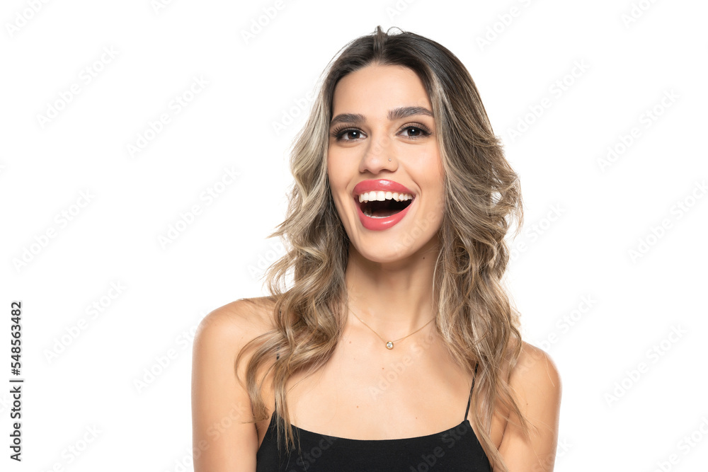 beautiful young happy women with makeup and long wavy hair on a white background. beautiful young happy women with makeup and long wavy hair on a white background.